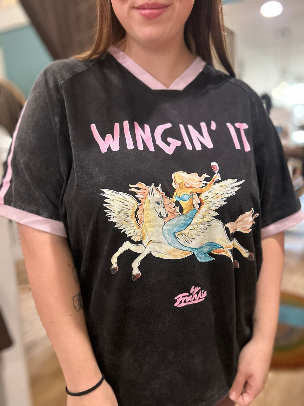 Wingin' It Tee in Black/Pink with Pegasus and mermaid graphic - front view