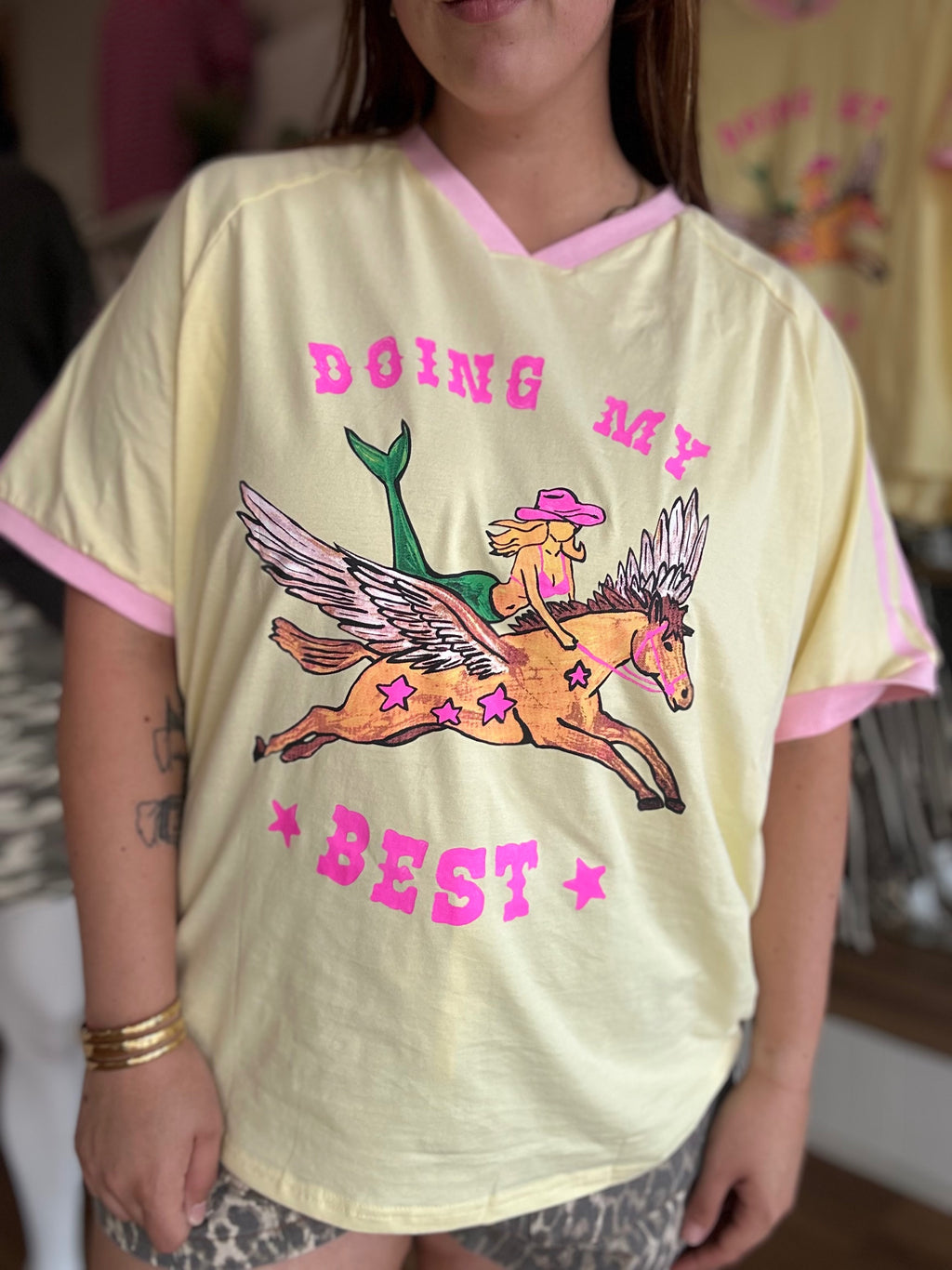Doing My Best oversized graphic tee in lemon yellow with a pink V neckline and pink sleeve stripes