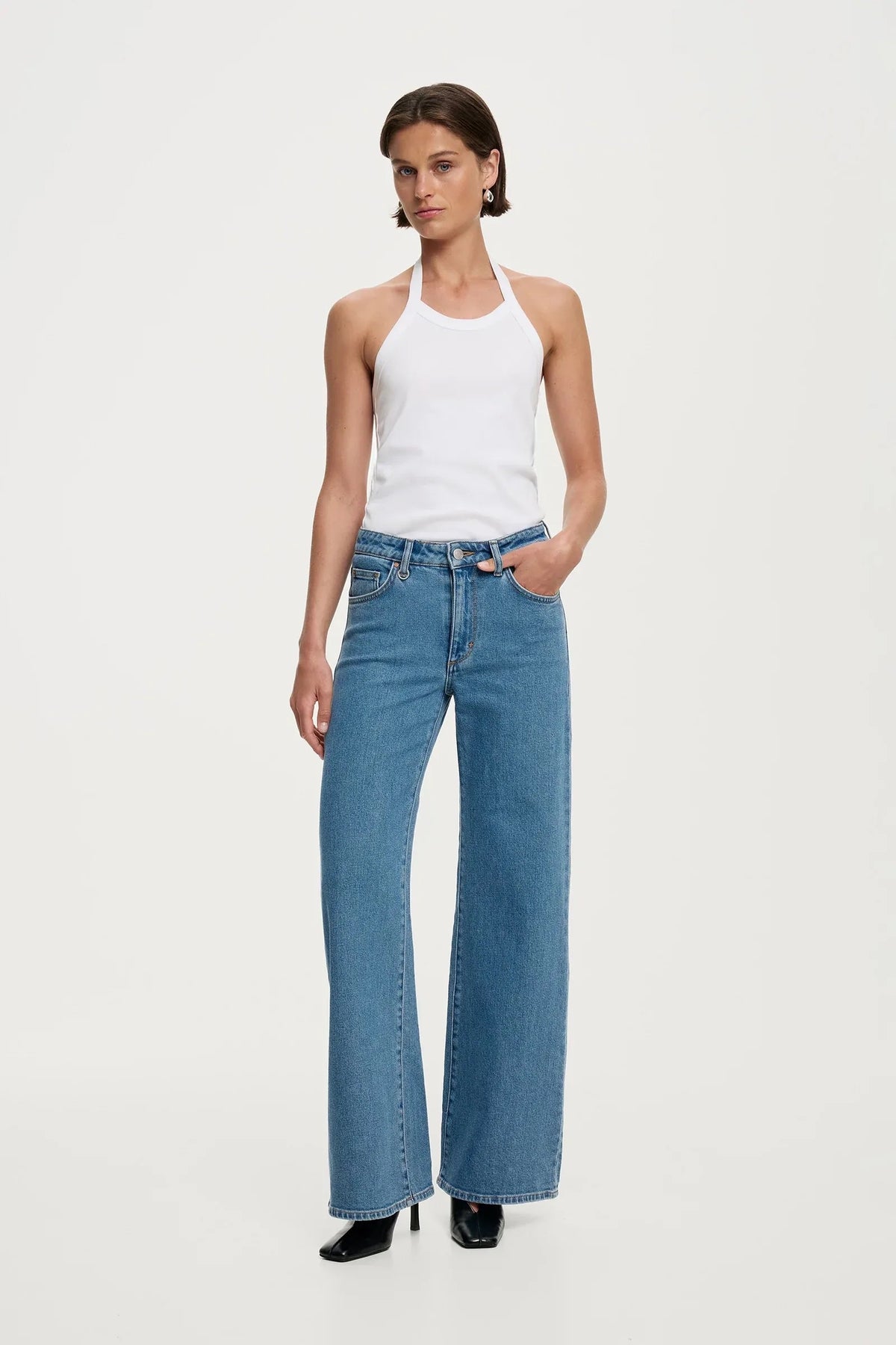 NEUW Eva Wide Jean in Florence, a mid vintage indigo blue wide leg jean with a fitted waist and floor skimming leg