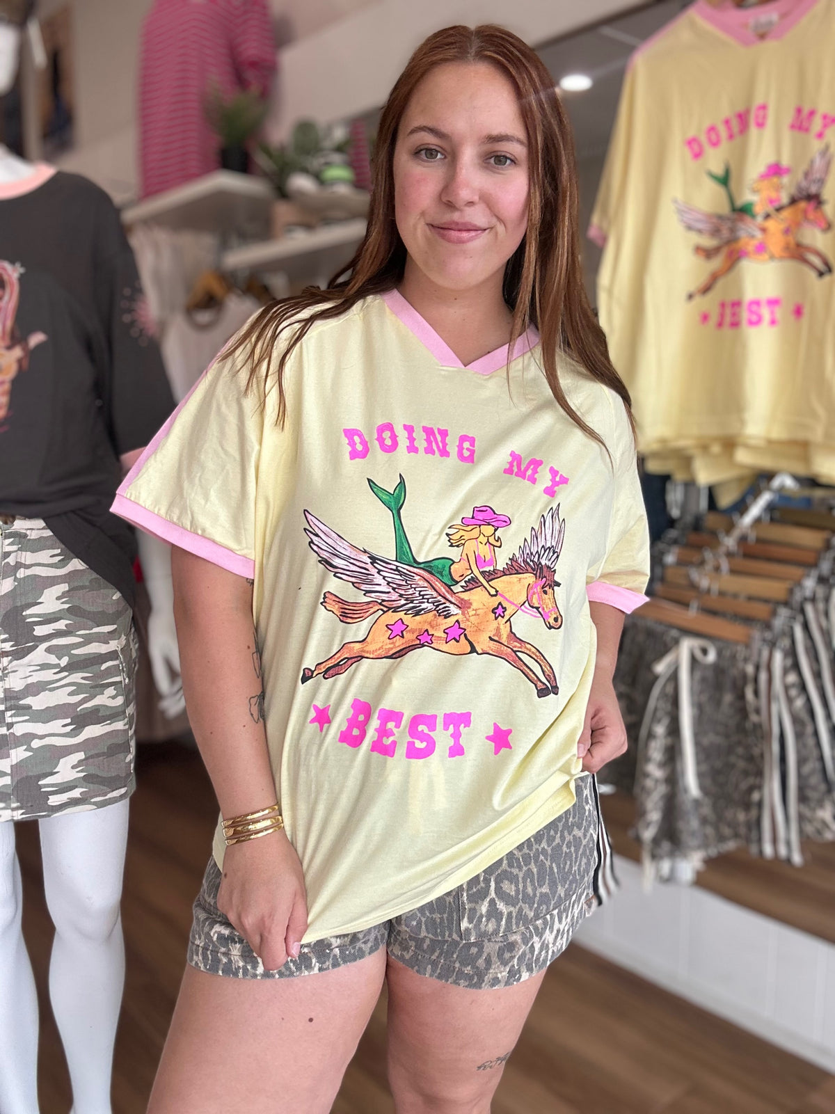 Doing My Best yellow tee with a cowgirl mermaid riding a winged horse graphic