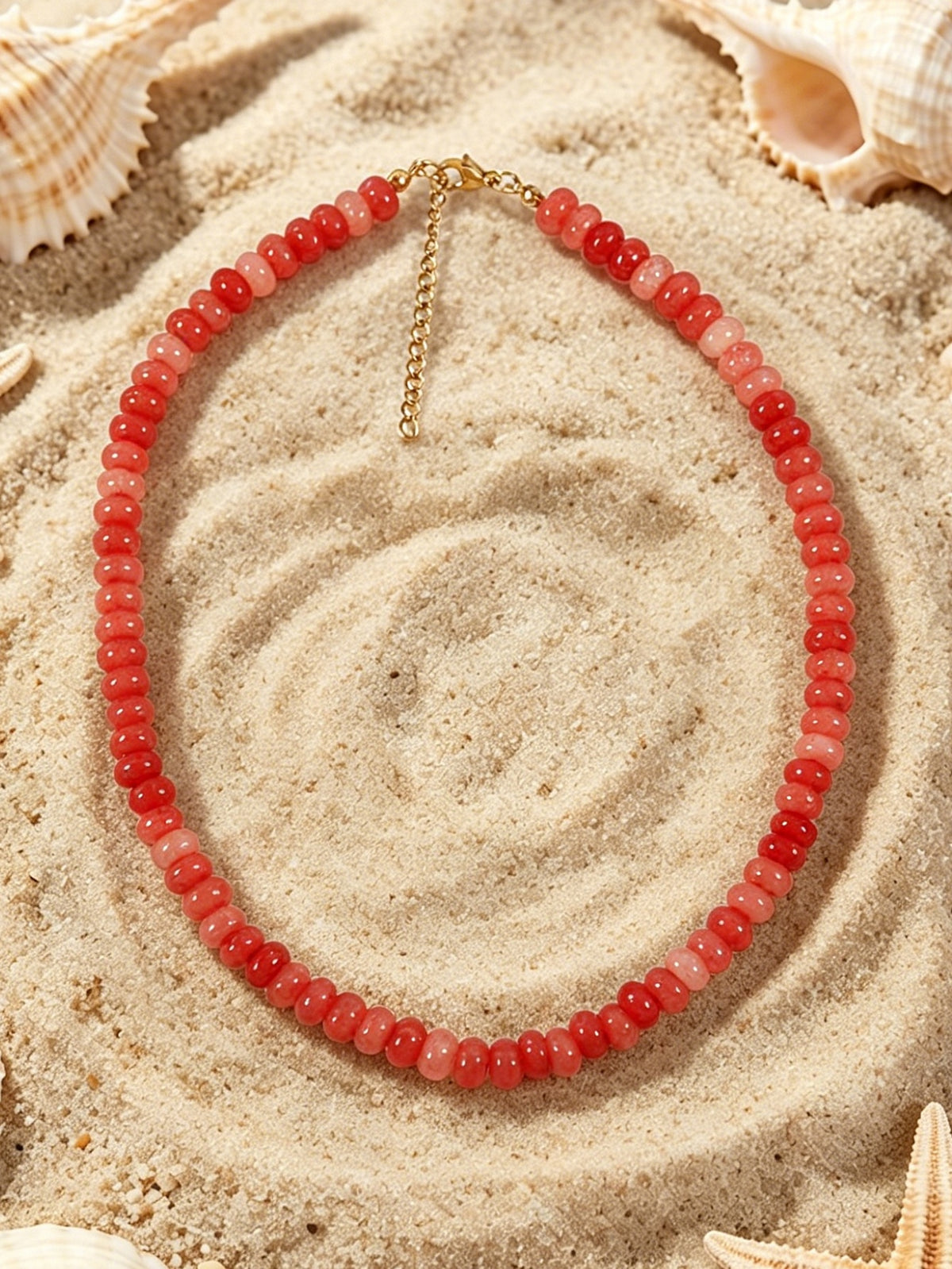 Sandbar coral red glass beaded necklace with gold tone clasp by Salt & Tide Co