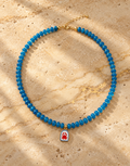 Seaside ocean blue glass bead necklace with enamel crab charm by Salt & Tide Co