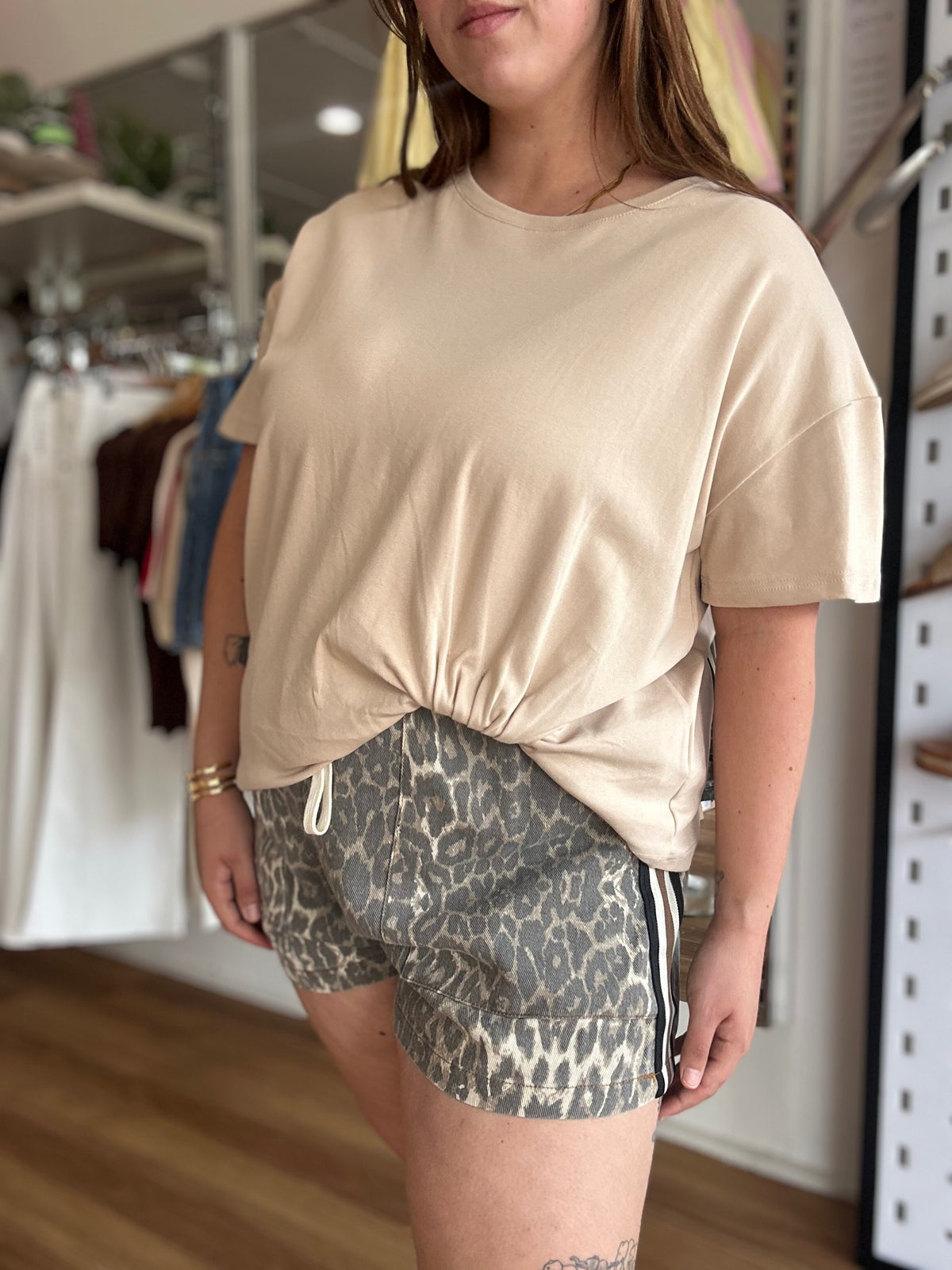 Another look at the By Frankie Starlight Leopard Stripe Shorts in neutral leopard print with a contrast racing stripe