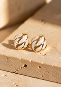 Swirl gold stud earrings with creamy white enamel swirl by Salt & Tide Co