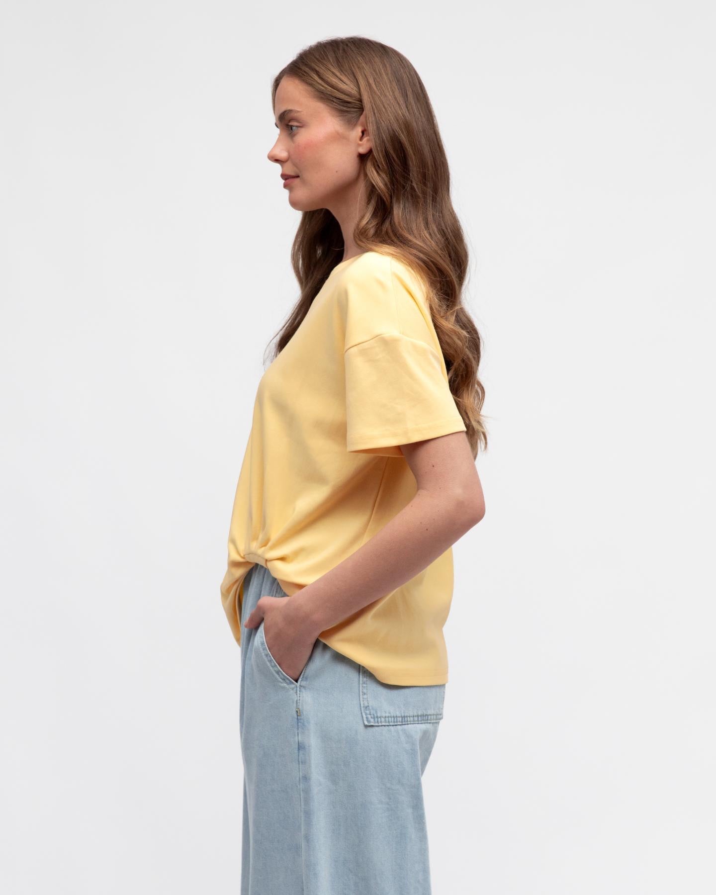 Easy Tuck Tee in Butter Yellow, gathered tuck hem detail - side view
