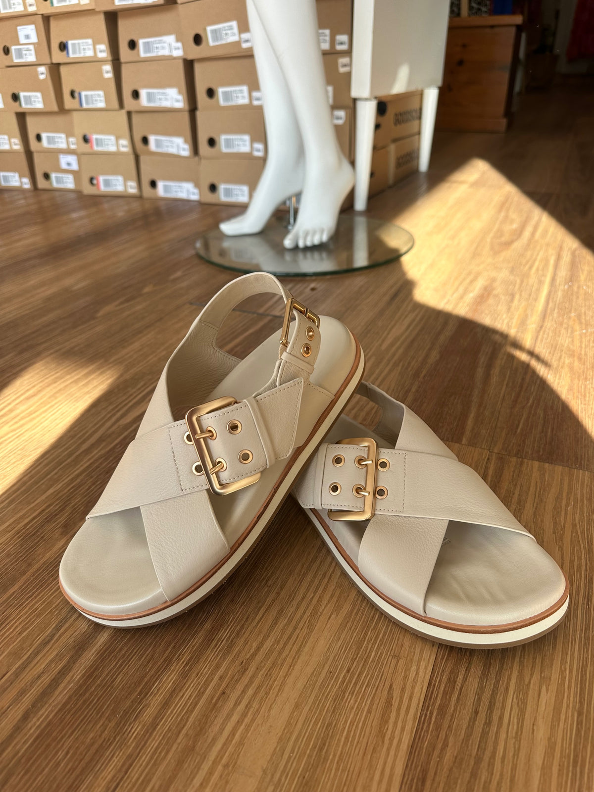 Luna Sole Sasha slingback sandal in ivory leather with crossover straps, oversized buckle and eyelet detail
