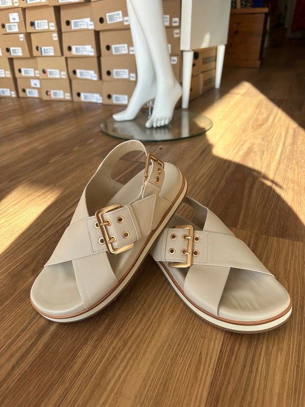 Luna Sole Sasha slingback sandal in ivory leather with crossover straps, oversized buckle and eyelet detail