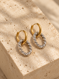 Tide two tone earrings with polished gold link through a twisted silver loop by Salt & Tide Co